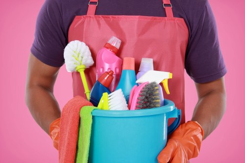 Cleaner working on a carpeted hallway in Elephant and Castle