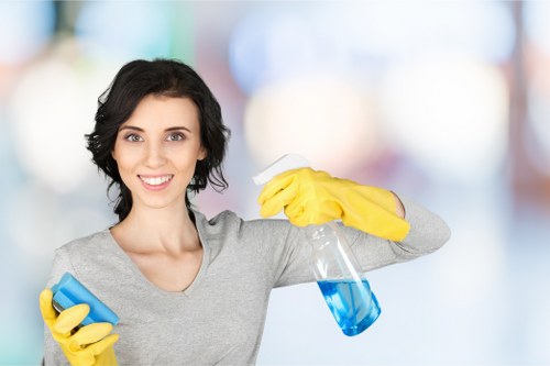 Technician treating a mattress stain during a local cleaning visit